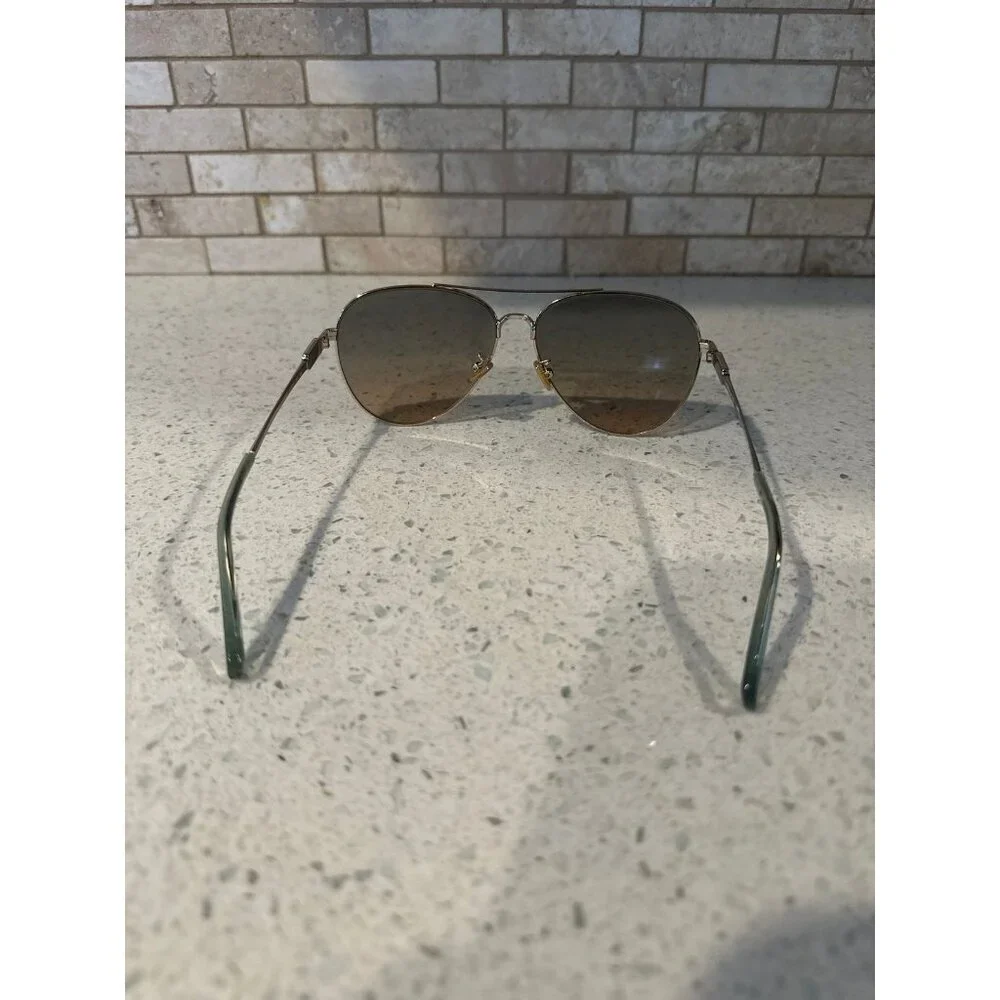 COACH WOMEN SUNGLASSES HC7140 CD474‎ Shiny Light Gold / Grey Gradient Polarized